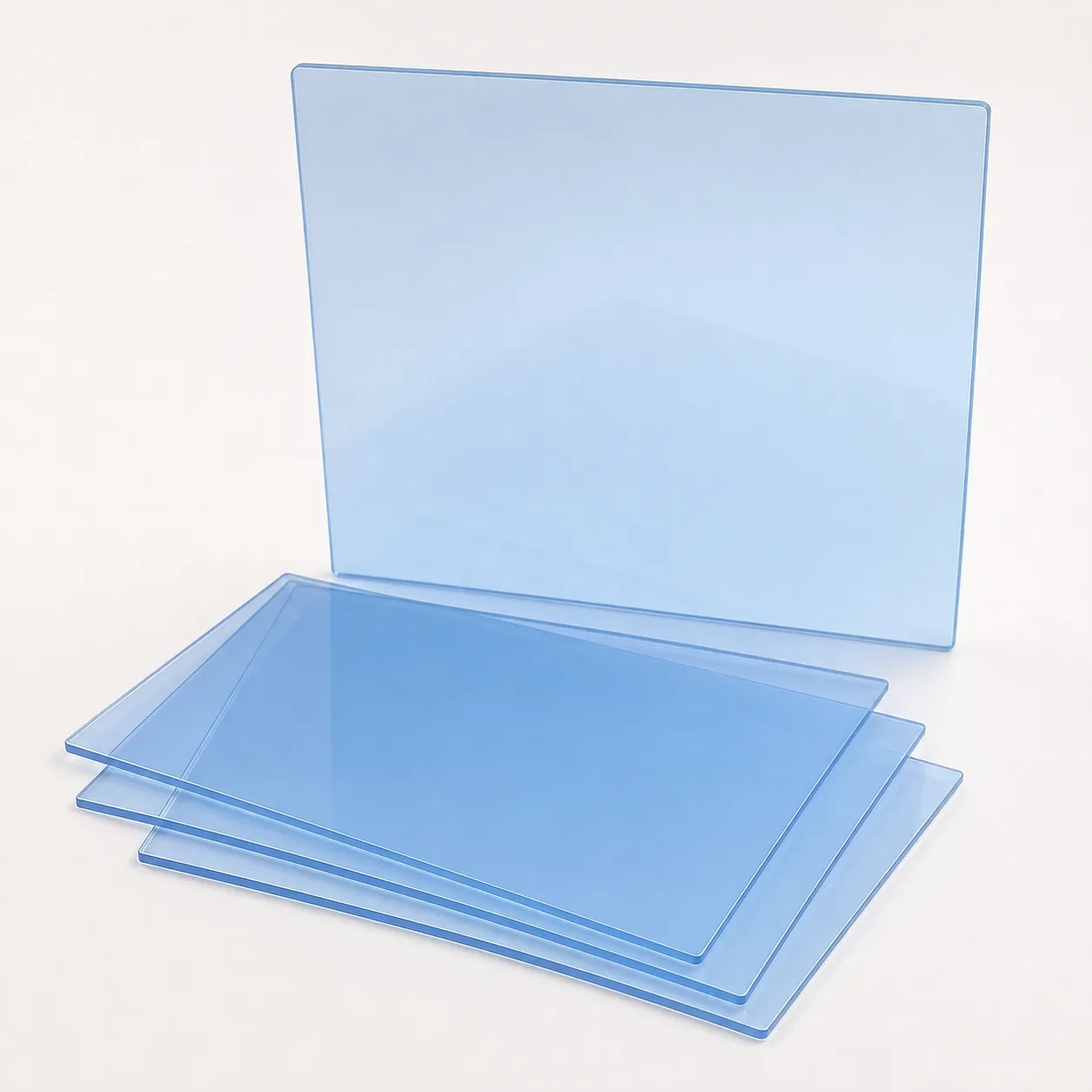 Blue translucent PVC and PET sheets arranged as flat garment template material panels