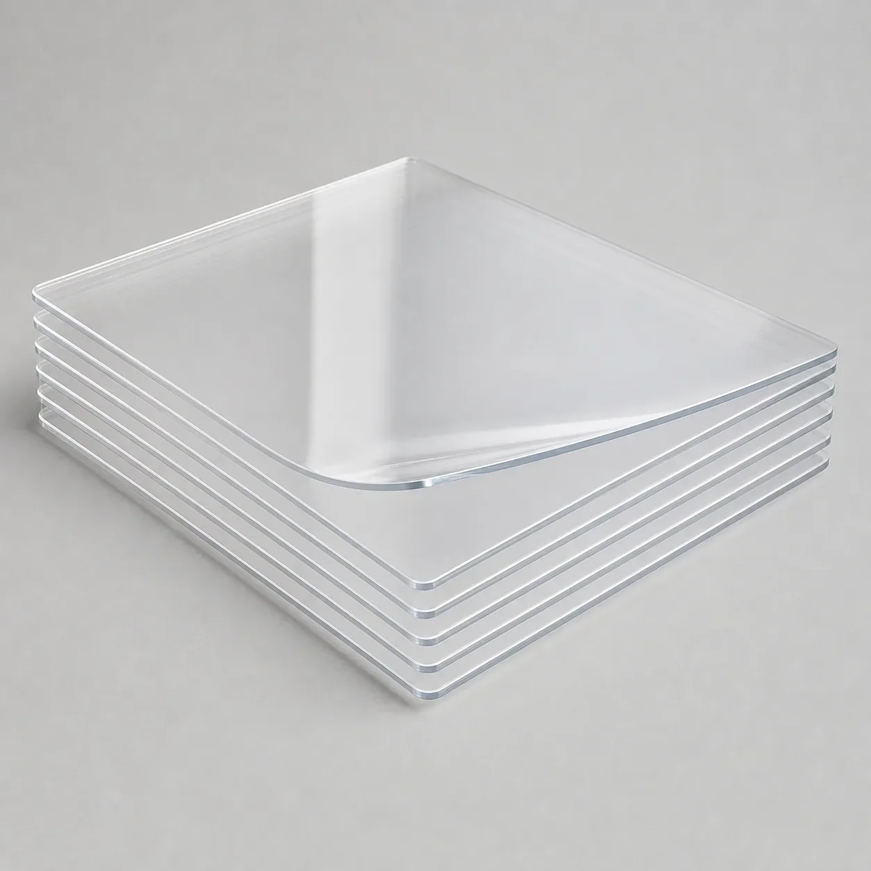 Clear rigid PVC garment template sheets arranged as unbranded rectangular material panels