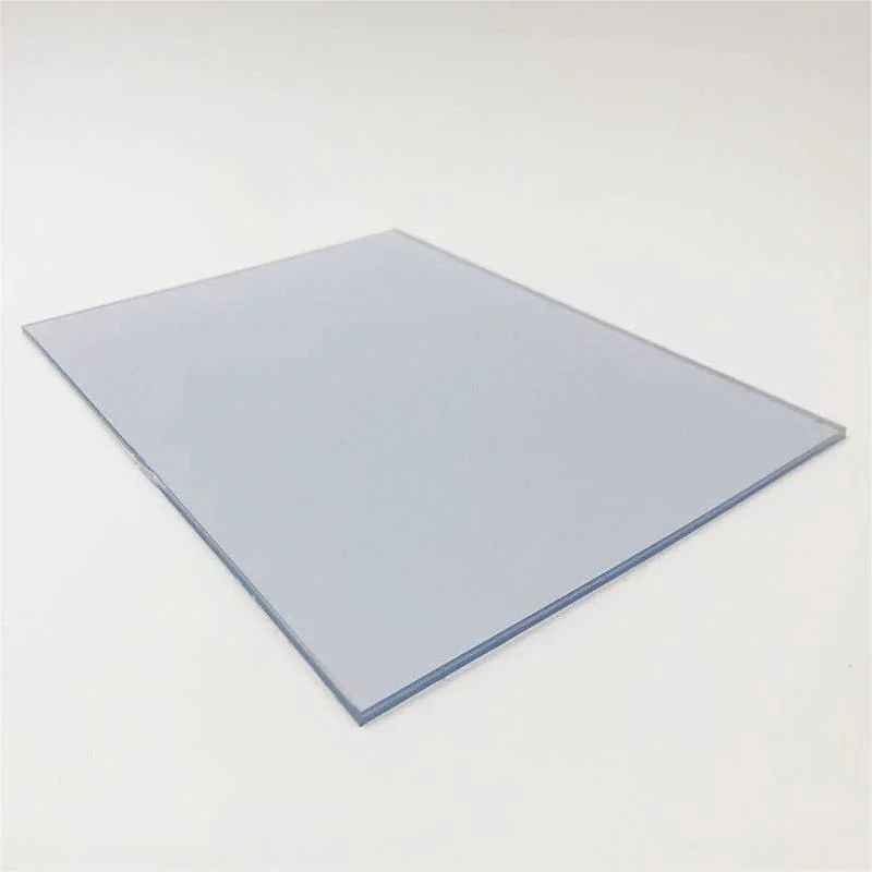 Transparent grey PVC garment template sheet on a neutral background