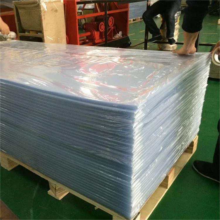 Wrapped stack of transparent PVC garment template sheets on a wooden pallet